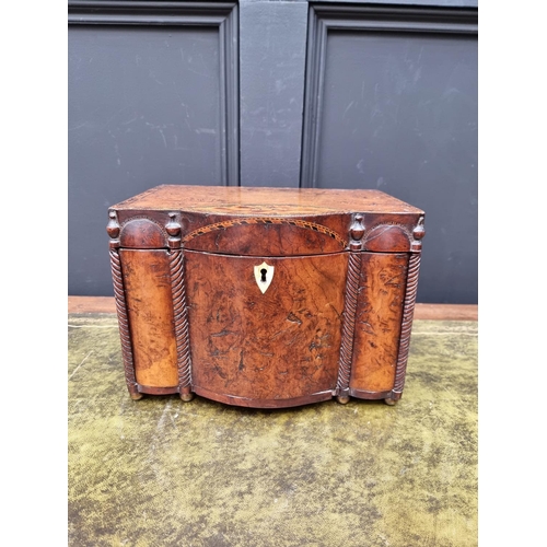 1129 - A very unusual late 18th century walnut and inlaid bowfront workbox, possibly Irish, the interior wi... 