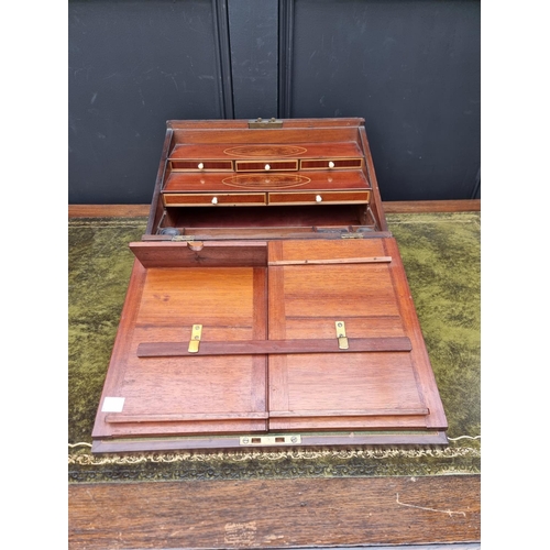 1136 - An unusual George III mahogany and inlaid writing slope, with bone knobs, 41cm wide.... 