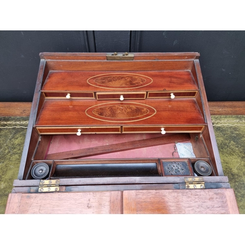 1136 - An unusual George III mahogany and inlaid writing slope, with bone knobs, 41cm wide.... 