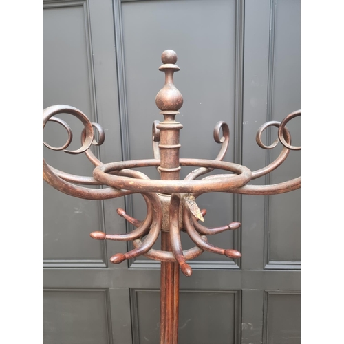 1137 - A large antique bentwood hat and coat stand, 208cm high, (losses). 