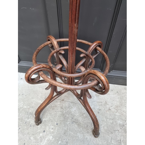 1137 - A large antique bentwood hat and coat stand, 208cm high, (losses). 