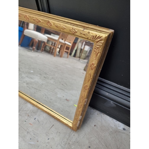 1140 - A George III giltwood framed rectangular pier mirror, 196.5 x 43cm. 