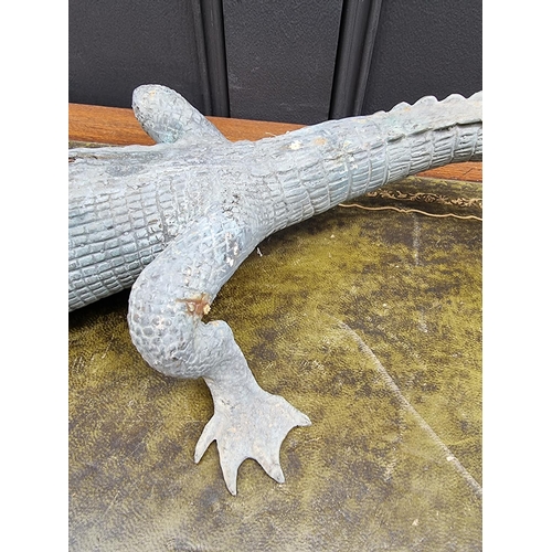 1268 - A copper alloy alligator or crocodile, 59cm long.