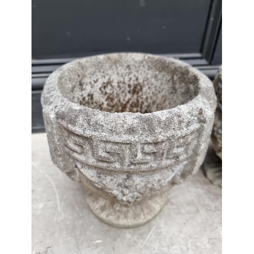 1270 - A set of three old weathered composition stone pedestal urns, 25.5cm high. ... 