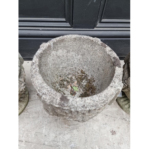 1270 - A set of three old weathered composition stone pedestal urns, 25.5cm high. ... 