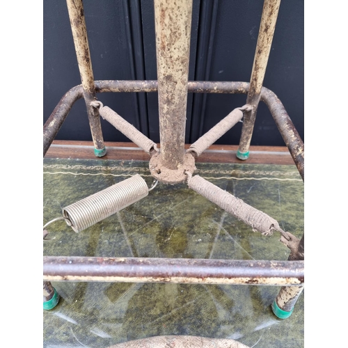 1276 - A vintage industrial painted tubular metal stool, with sprung suspension.