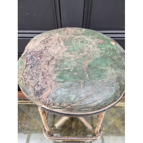 1276 - A vintage industrial painted tubular metal stool, with sprung suspension.