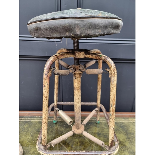 1276 - A vintage industrial painted tubular metal stool, with sprung suspension.