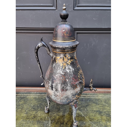 1283 - An early 19th century Pontypool toleware tea urn and cover, 51cm high.