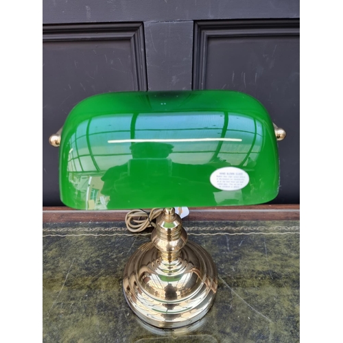 1285 - A reproduction glass and green glass desk lamp. 