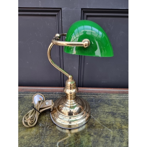 1285 - A reproduction glass and green glass desk lamp. 