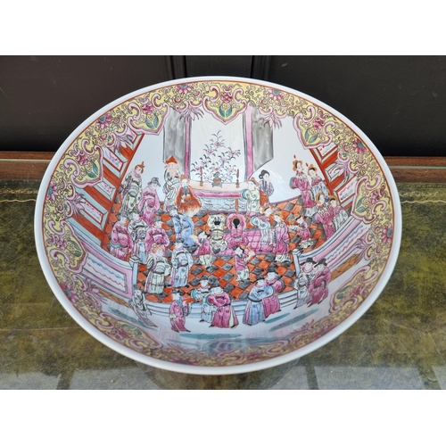 1291 - A large Chinese famille rose bowl, four character mark to base, 36cm diameter.