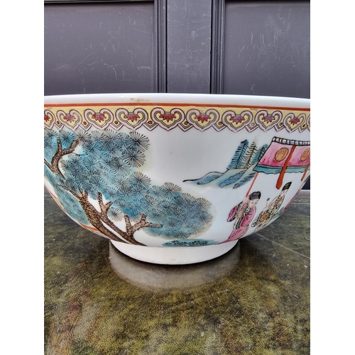 1291 - A large Chinese famille rose bowl, four character mark to base, 36cm diameter.