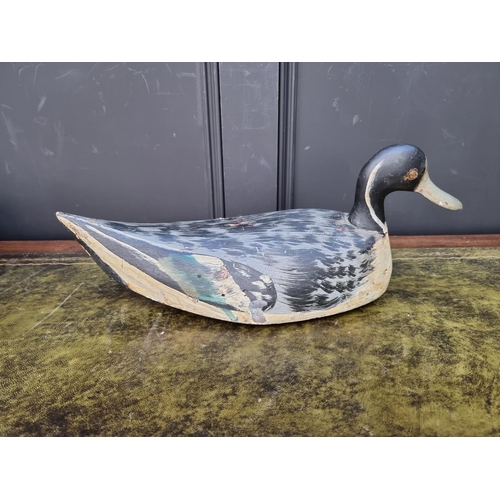 1292 - An old painted wood decoy duck, 44cm long. 