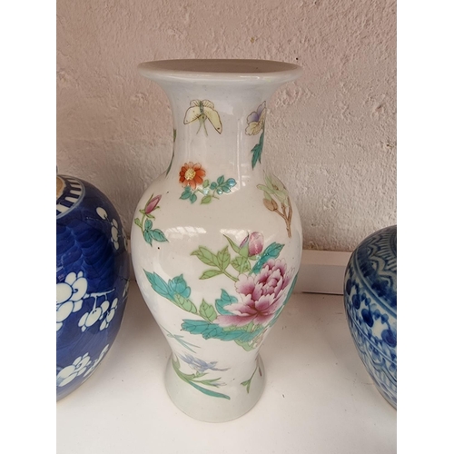 1331 - A small quantity of Chinese ceramics; together with another European tin glazed vase. (5)... 