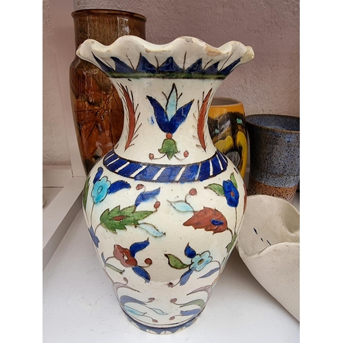 1335 - A mixed lot of ceramics, to include Poole, Karl Ens and studio pottery, largest 26cm high. (2 shelve... 