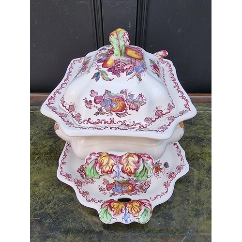 1343 - A Mason's 'Fruit Basket' pattern soup tureen, cover, stand, and ladle, 37cm wide. ... 