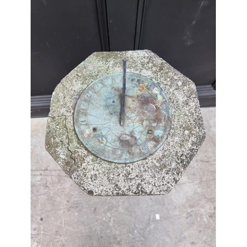 1352 - An old composition stone sundial, total height 84cm. 