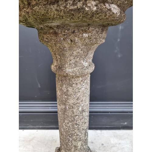 1352 - An old composition stone sundial, total height 84cm. 