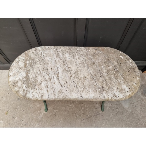 1358 - A marble top and cast iron base table, 119.5cm wide.