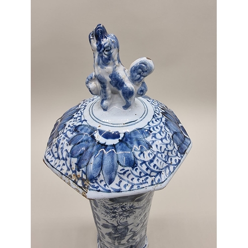 1359 - A tin glazed pottery delftware vase and cover, 18th/19th century, painted with a Chinese figure, 35.... 