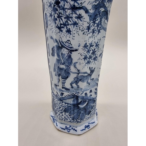 1359 - A tin glazed pottery delftware vase and cover, 18th/19th century, painted with a Chinese figure, 35.... 