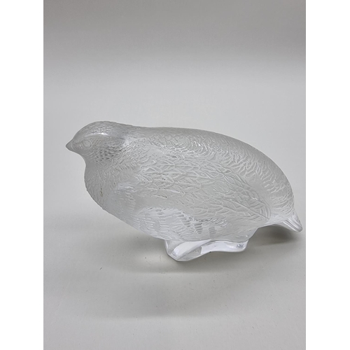 1365 - A Lalique 'Perdrix Couchee' frosted glass figure, 15.5cm long, (chip to beak).... 