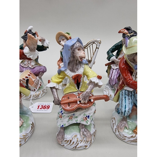 1369 - A set of twelve Dresden monkey band figures, largest 16cm high. 