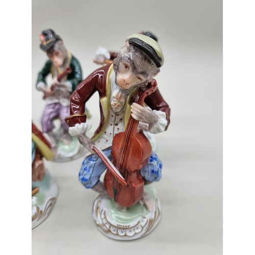 1369 - A set of twelve Dresden monkey band figures, largest 16cm high. 