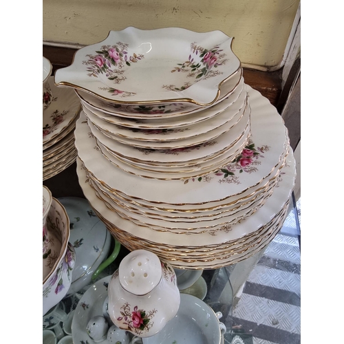 1381 - A Royal Albert 'Lavender Rose' pattern part tea and dinner service; together with another Royal Albe... 