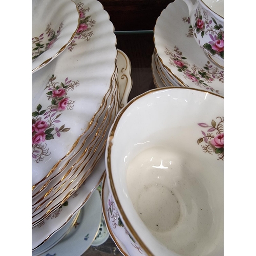 1381 - A Royal Albert 'Lavender Rose' pattern part tea and dinner service; together with another Royal Albe... 