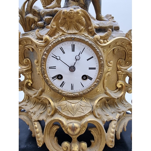 1386 - A late 19th century gilt spelter mantel clock, 43.5cm high, with pendulum, on ebonized stand.&n... 