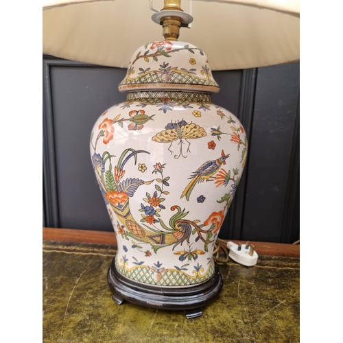 1424 - A pair of Chinese crackle glaze vase form table lamps, total height 65cm.