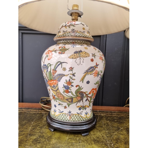 1424 - A pair of Chinese crackle glaze vase form table lamps, total height 65cm.