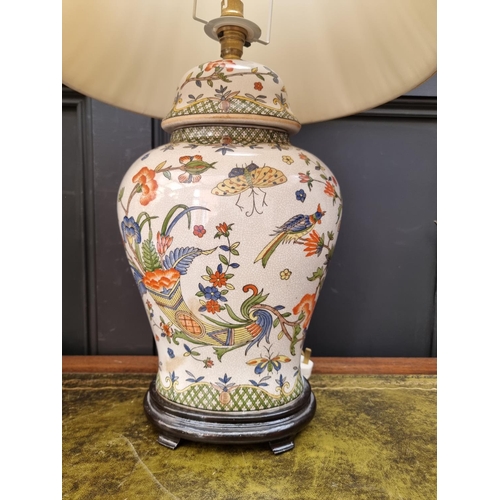 1424 - A pair of Chinese crackle glaze vase form table lamps, total height 65cm.