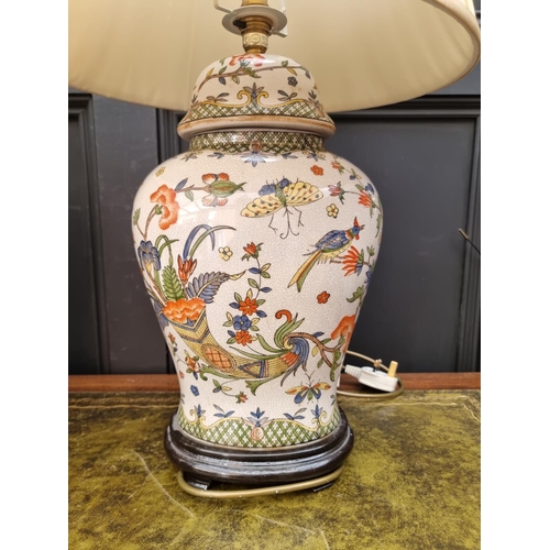 1424 - A pair of Chinese crackle glaze vase form table lamps, total height 65cm.