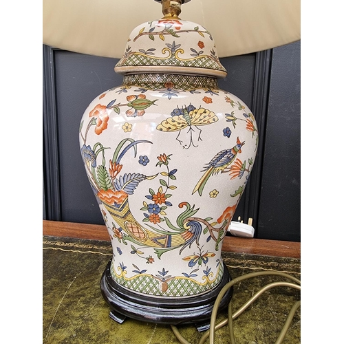 1424 - A pair of Chinese crackle glaze vase form table lamps, total height 65cm.