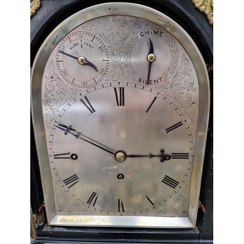 1425 - A large late 19th century ebonized and brass bracket type triple fusee clock, with silvered dia... 