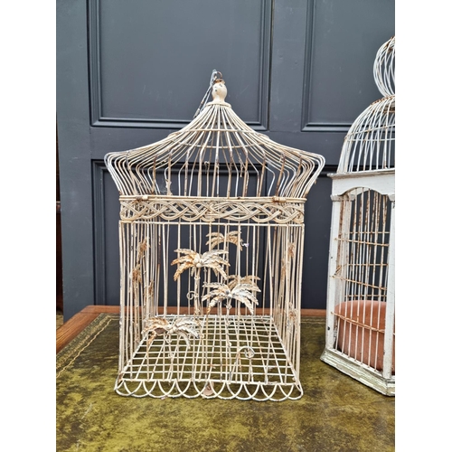 1426 - Two old white painted wirework bird cages, largest 71cm high. 