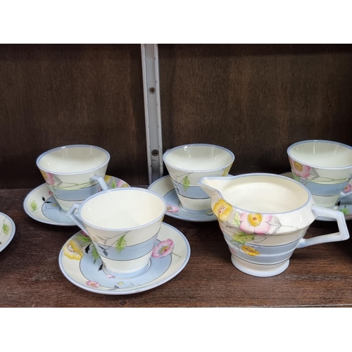 1440 - An Art Deco Paragon part tea service; together with a set of six Tuscan china coffee cans and s... 