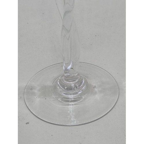 1452 - A pair of oversize clear glass candle holders, 50cm high. 