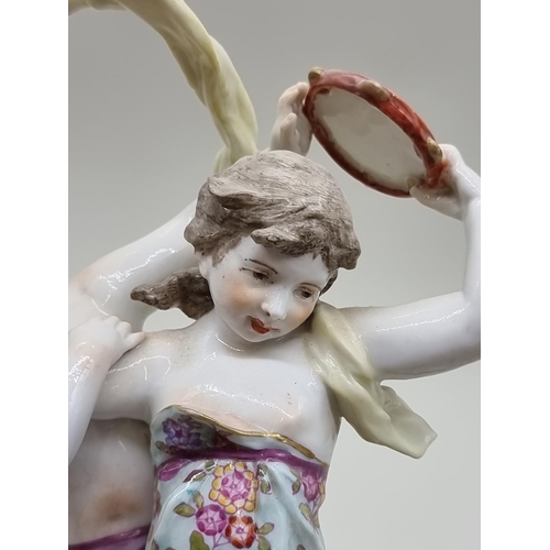 1454 - A Continental porcelain mantel timepiece, 37cm high.