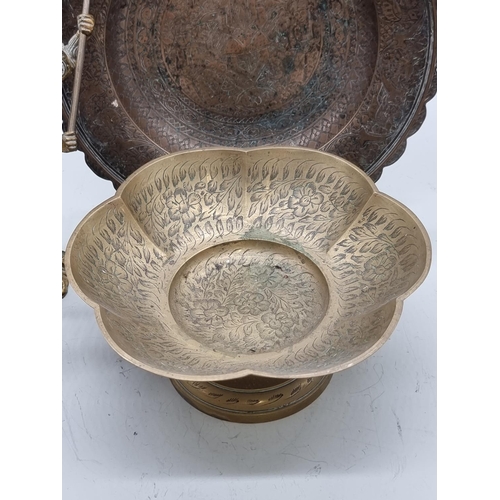 1457 - A small group of Eastern metalware, to include a bronze dish, 26cm diameter. (4)