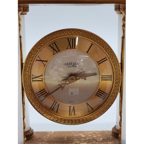 1473 - A vintage gilt brass and glass 'Carillon' portico style clock, 15cm high; together with a combi... 