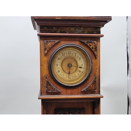 1487 - An Edwardian walnut and inlaid novelty longcase timepiece, 27cm high; together with three other... 