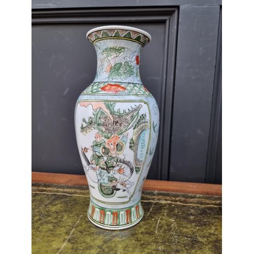 1491 - A Chinese famille verte vase, 30.5cm high; together with another Chinese vase; and two further Japan... 