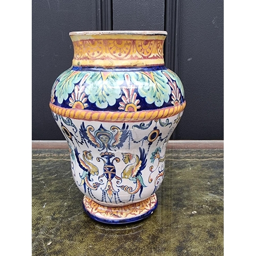 1542 - An Italian maiolica drug jar, 17.5cm high, (chips).