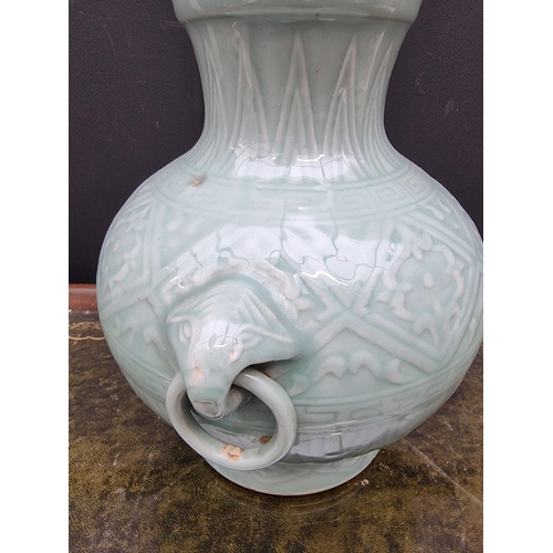 1546 - A large Chinese celadon twin handled vase, seal mark to base, 26.5cm high; together with a simi... 