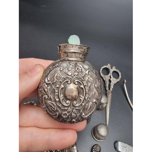 103 - A Victorian green glass salts bottle having hinged silver cover, by A&J Zimmerman, Birmingham 18... 