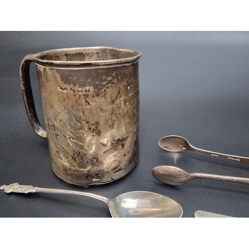 117 - A pair of George III silver sugar tongs; together with a set of six silver apostle coffee spoons and... 